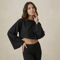 Black Top with Asymmetric Neck and Cape Sleeve Detail
